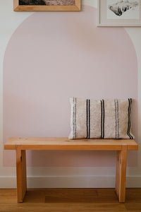 Boho Arch Wall Decal behind a bench