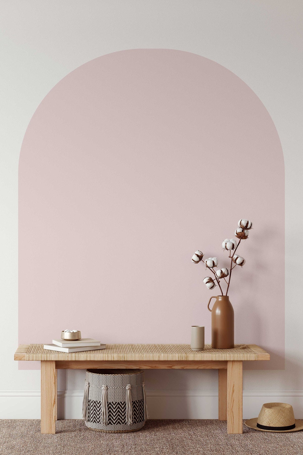 Boho Arch Wall Decal in pink behind a bench