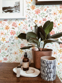 Spring Wildflower Wallpaper behind a rubber plant