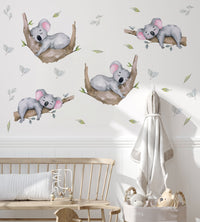 Sleeping Koala Wall Decals behind a bench