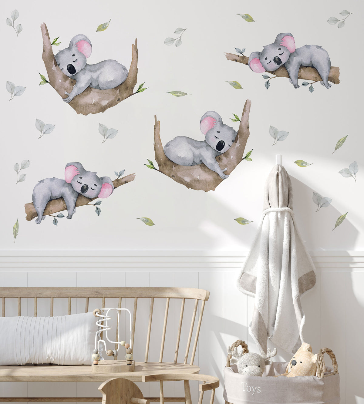 Sleeping Koala Wall Decals behind a bench