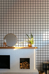 Black and White Grid Wallpaper above a fireplace