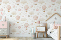 Pink Hot Air Balloon Wallpaper behind a house-shaped bed