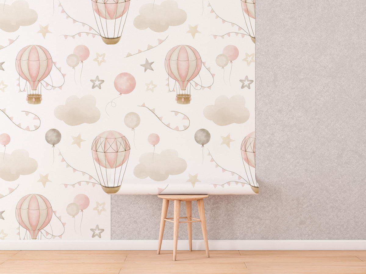 Pink Hot Air Balloon Wallpaper roll shown against a wall