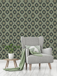 Vintage Green Medallion Wallpaper behind a grey armchair