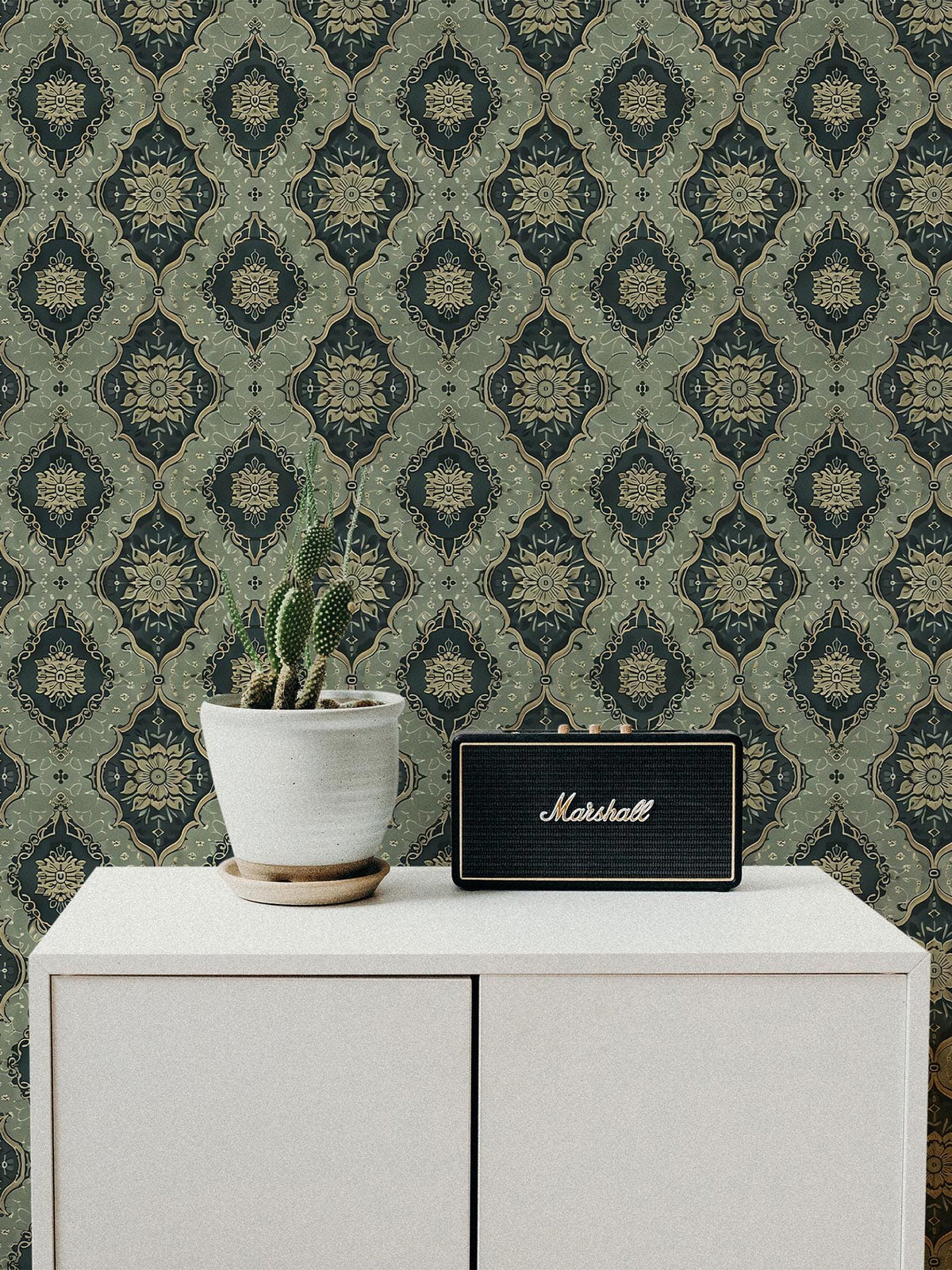 Vintage Green Medallion Wallpaper behind a white cabinet
