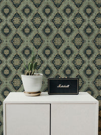 Vintage Green Medallion Wallpaper behind a white cabinet