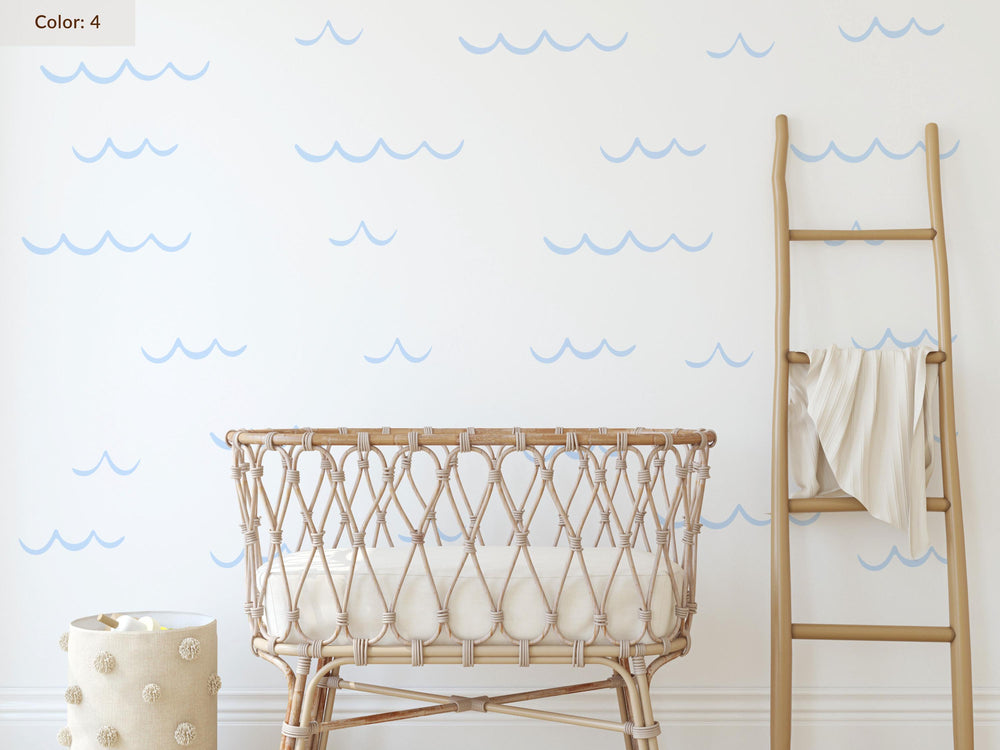 Ocean Wave Wall Decals in ice blue above a crib