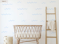 Ocean Wave Wall Decals in ice blue above a crib