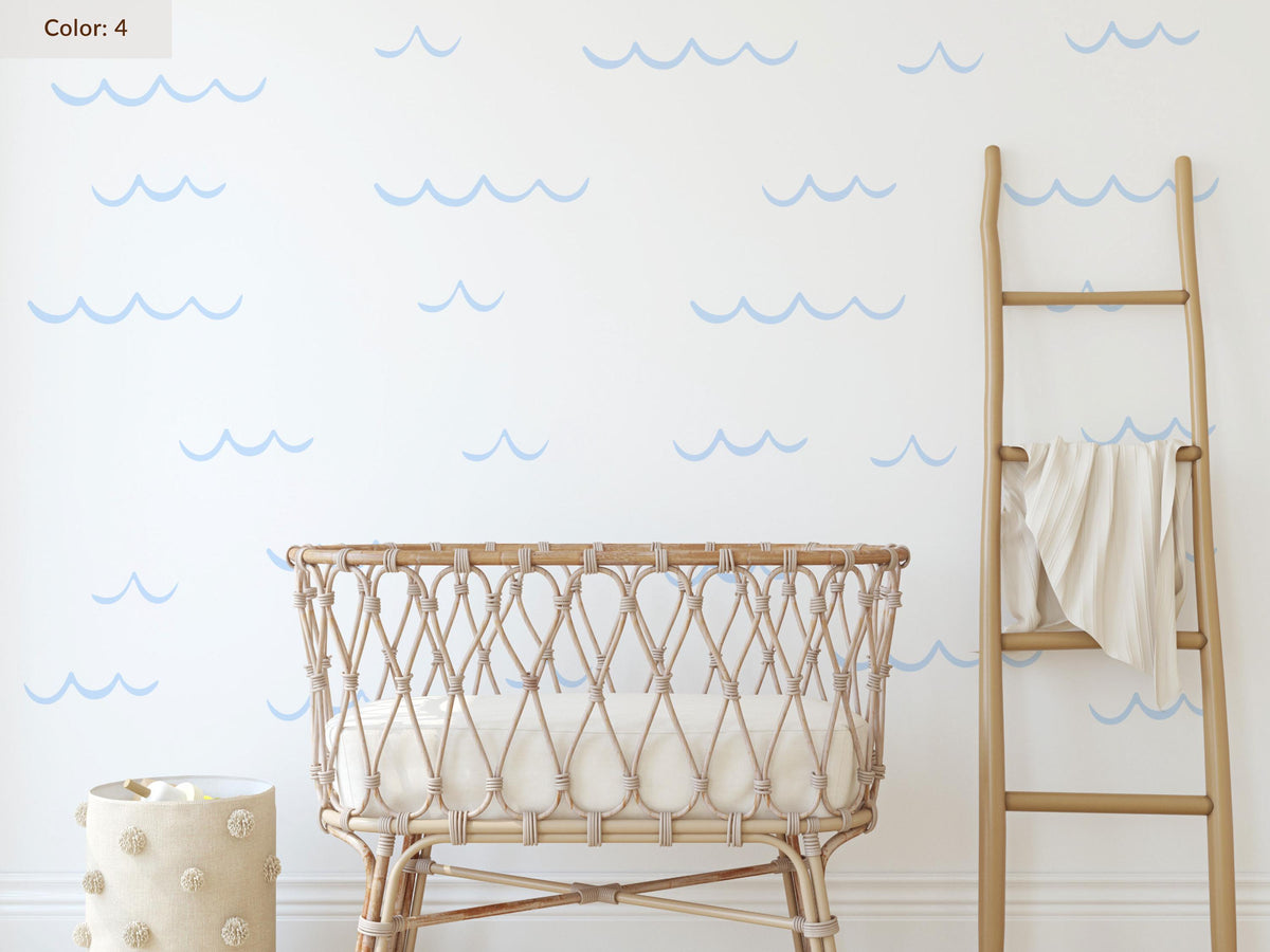 Ocean Wave Wall Decals in ice blue above a crib