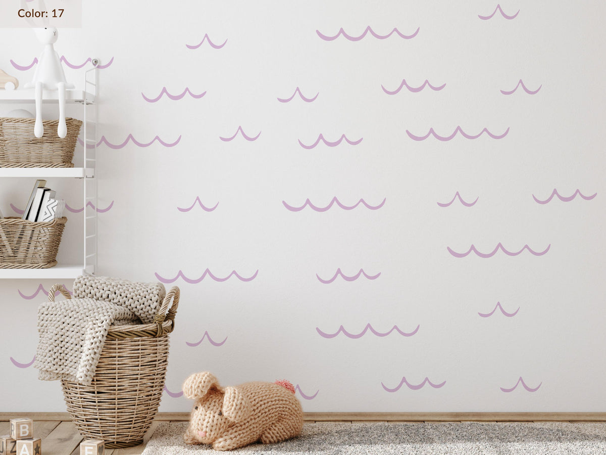 Ocean Wave Wall Decals in dusty pink in a nursery