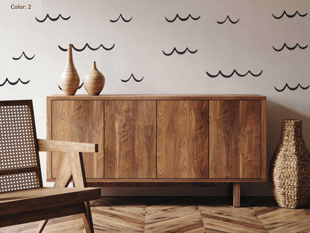 Ocean Wave Wall Decals in charcoal above a sideboard