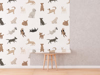 Dog Doodle Wallpaper roll shown against a wall