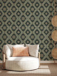 Vintage Green Medallion Wallpaper behind a round armchair