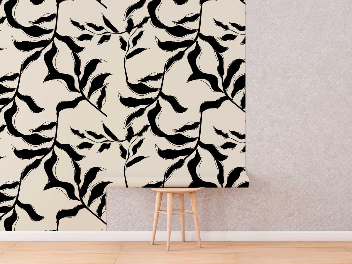 Abstract Leaves Wallpaper roll shown against a wall