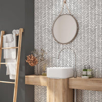 Black and White Herringbone Wallpaper in a bathroom