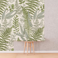 Sage Fern Botanical Wallpaper roll shown against a wall