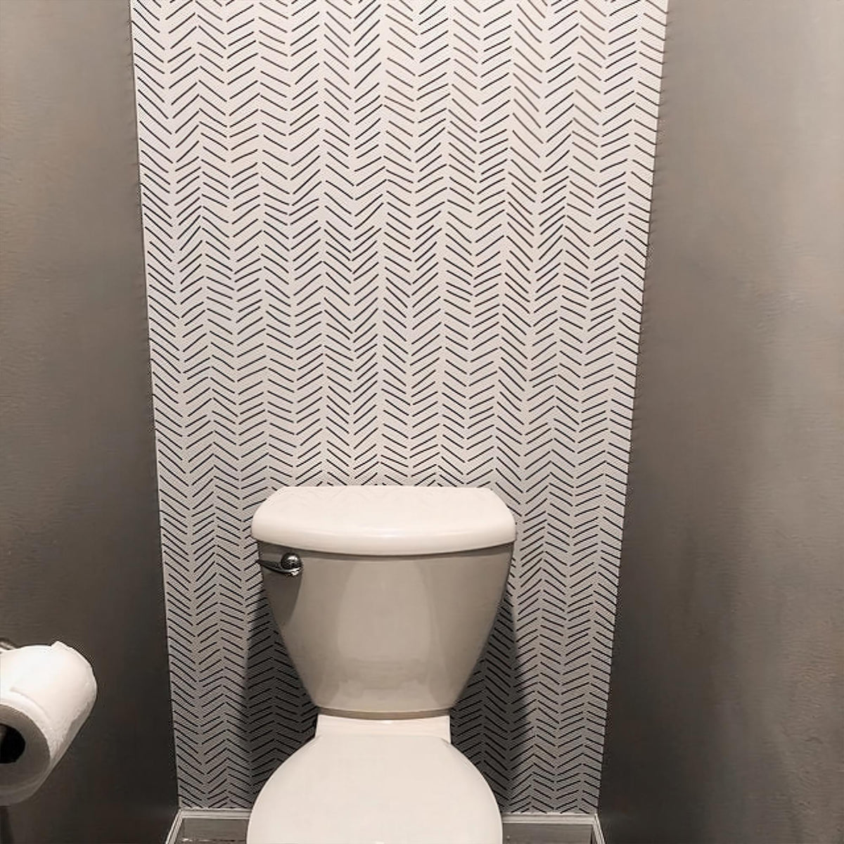 Black and White Herringbone Wallpaper in a cloakroom