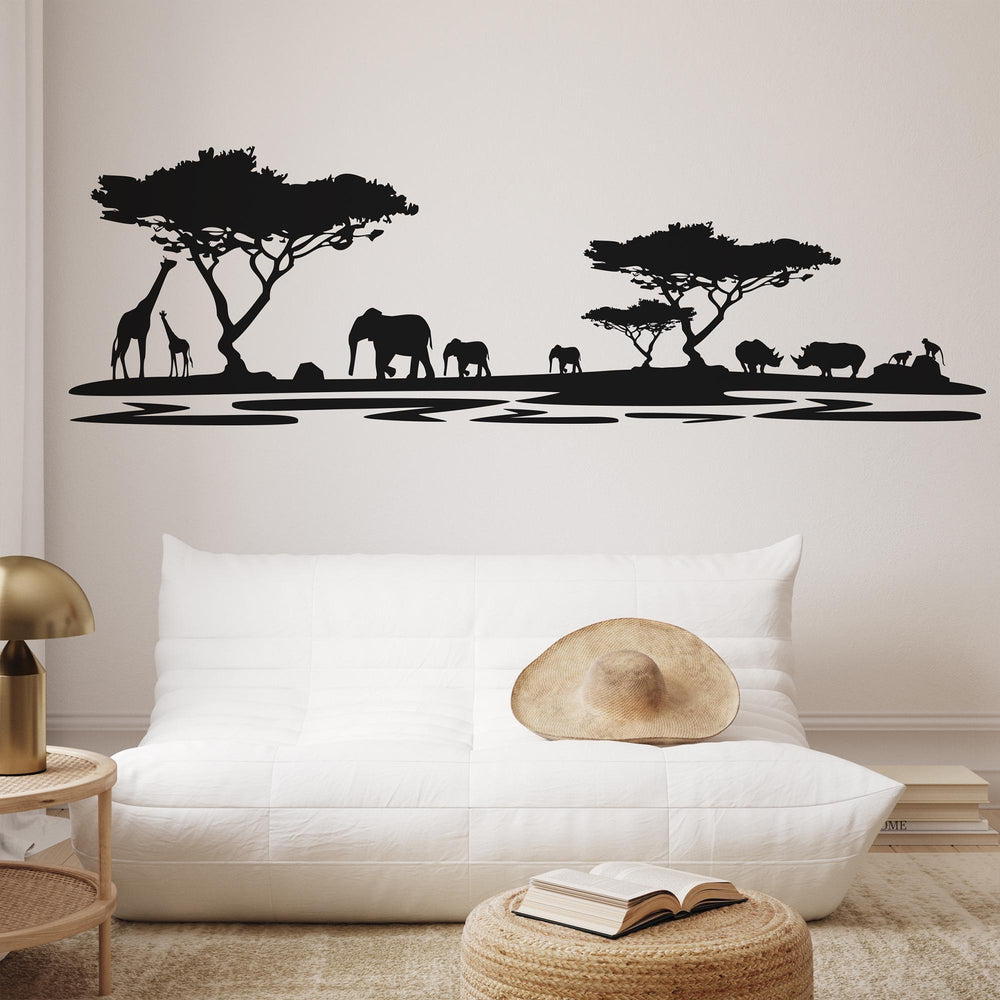 African Safari Silhouette Wall Decal in black above a sofa