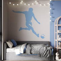 Football Player Wall Decal in blue above a bed