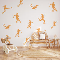 Girls Football Wall Decals in orange in a playroom