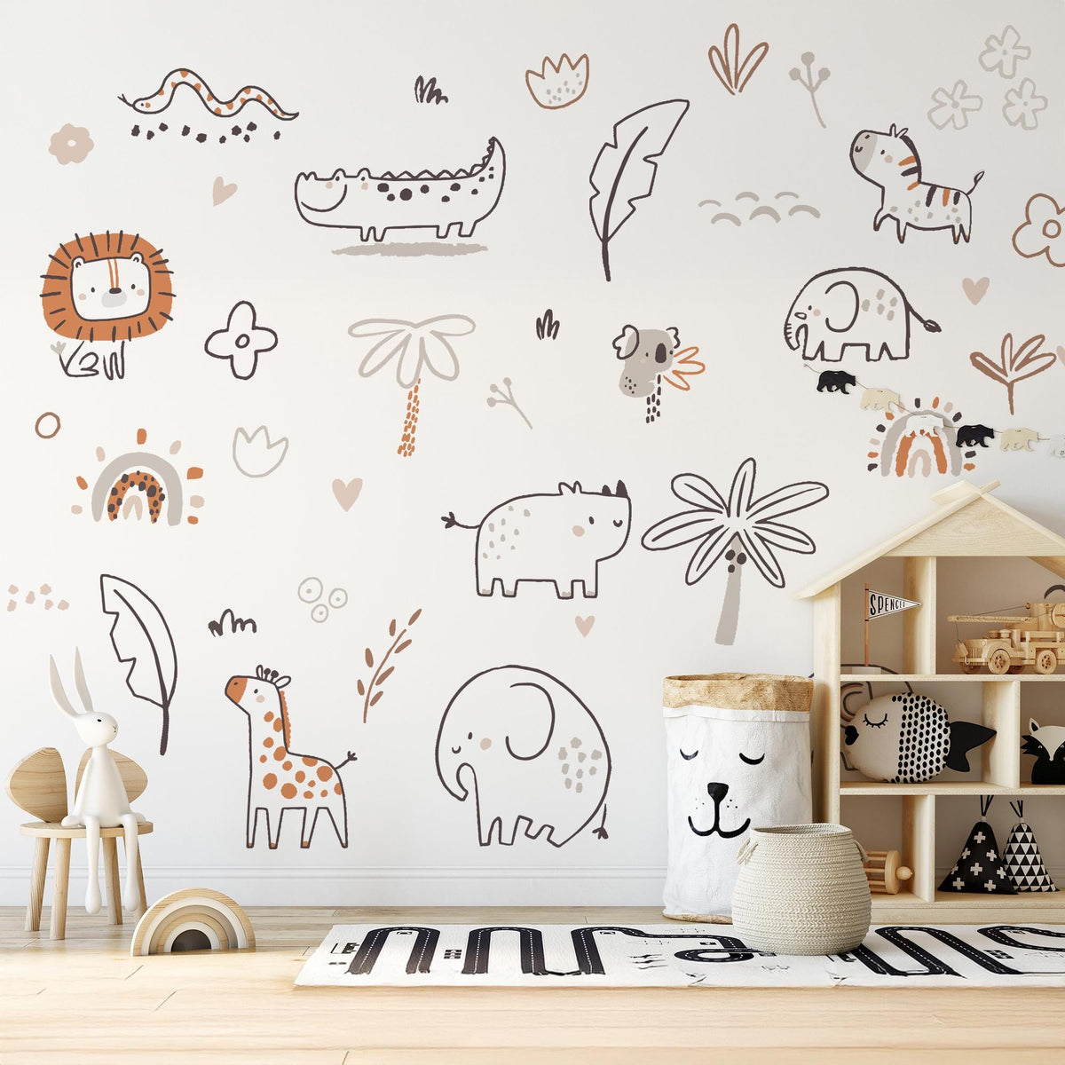 Boho Safari Animal Wall Decals beside a toy shelf