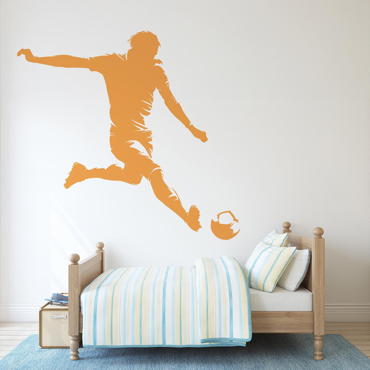 Football Player Wall Decal in orange above a bed