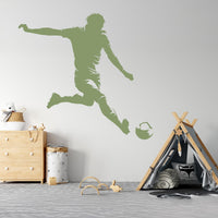 Football Player Wall Decal in green in a playroom
