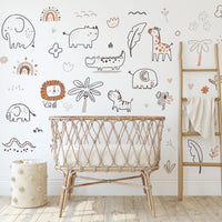 Boho Safari Animal Wall Decals above a cot