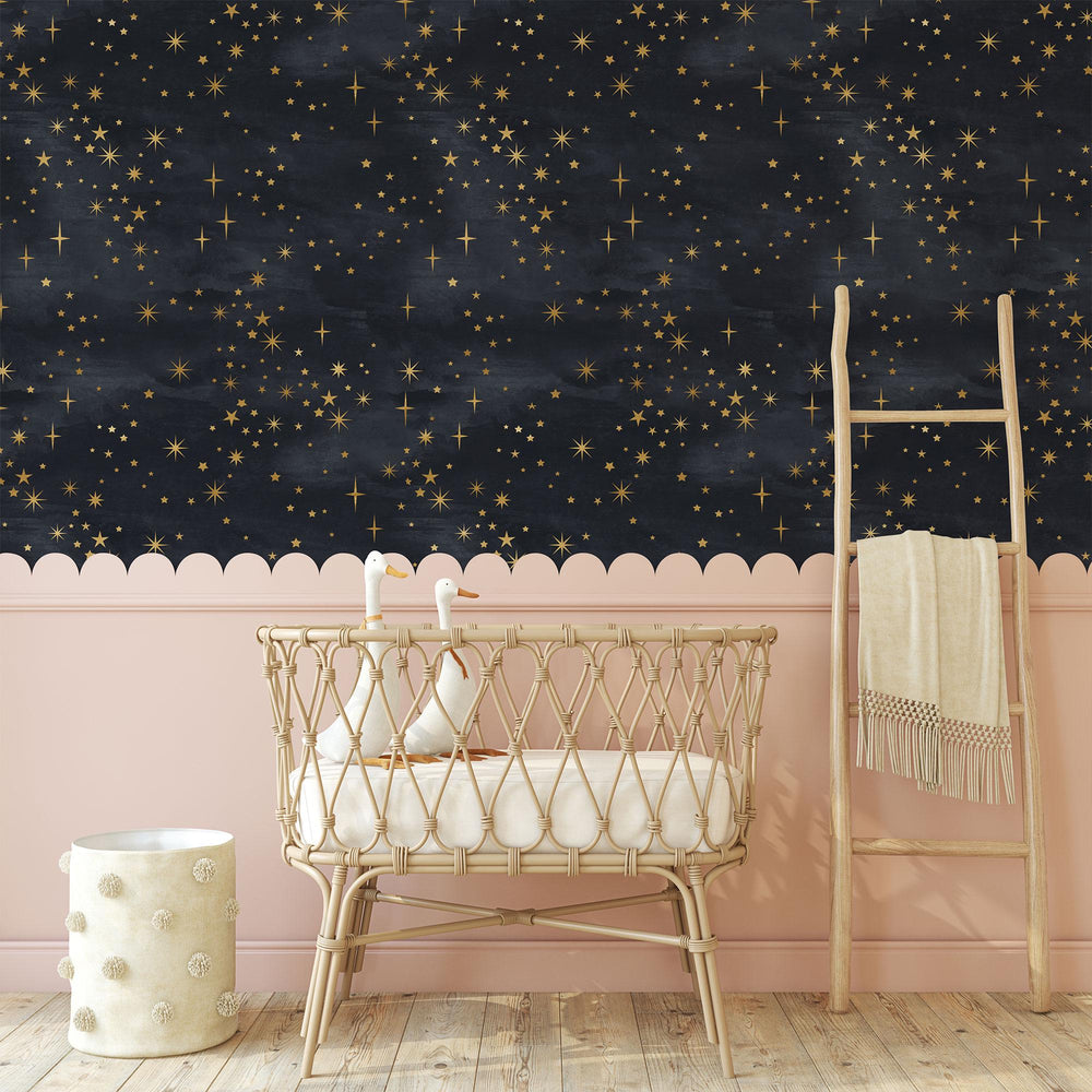 Celestial Starry Night Wallpaper above a scalloped dado in a nursery