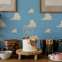 Blue Cloud Wallpaper behind a party table