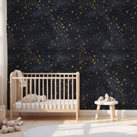 Celestial Starry Night Wallpaper behind a cot