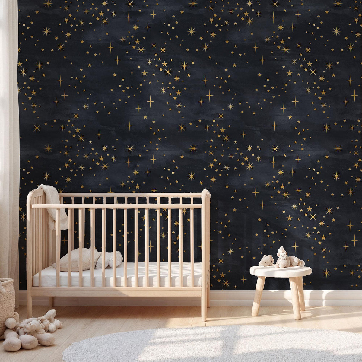 Celestial Starry Night Wallpaper behind a cot