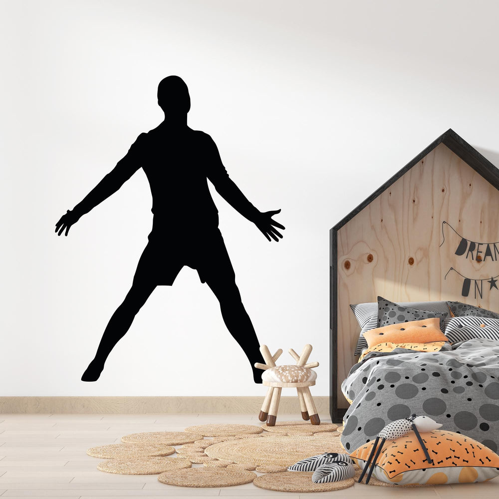 Football Celebration Wall Decal above a bed