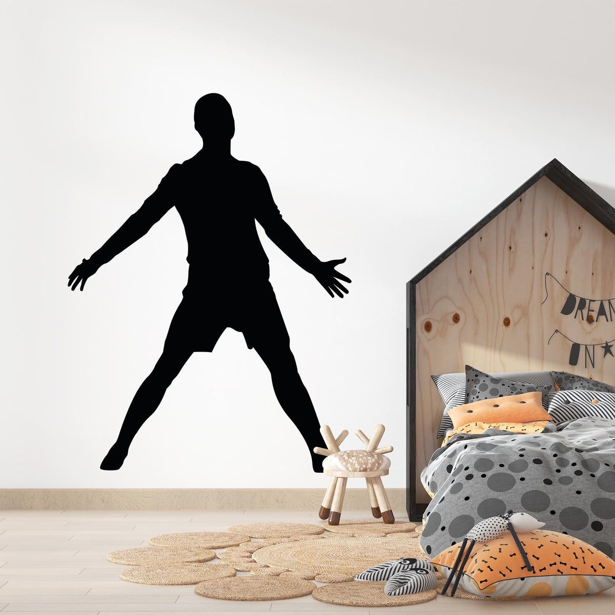 Football Celebration Wall Decal above a bed
